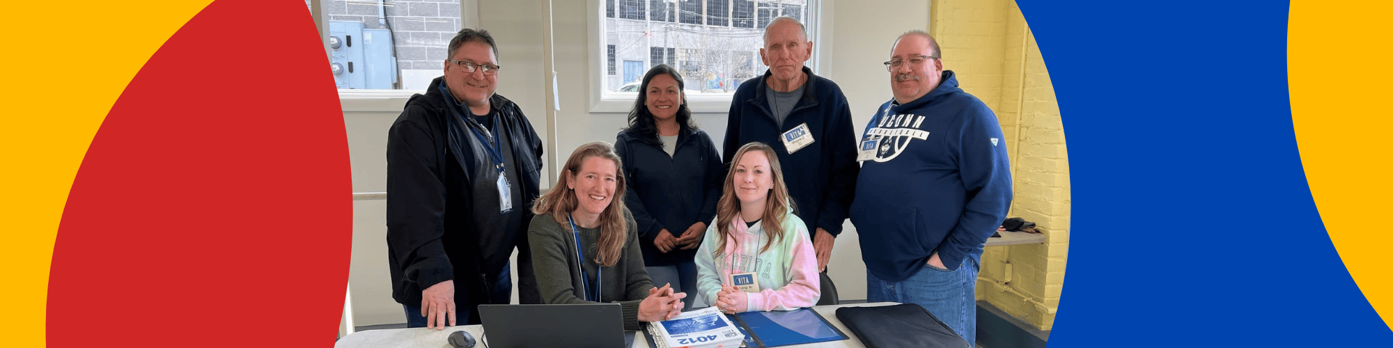 VITA volunteers support families with filing taxes